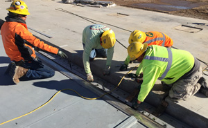 workers install seal