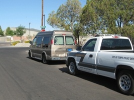 Traffic Enforcement truck and a brown van