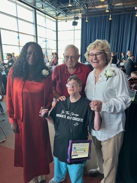 Counclmembers Hodge and Adams pose with attendees at the Mayor's All Abilities