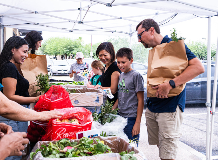 residents getting food at a Grow Local Tempe event