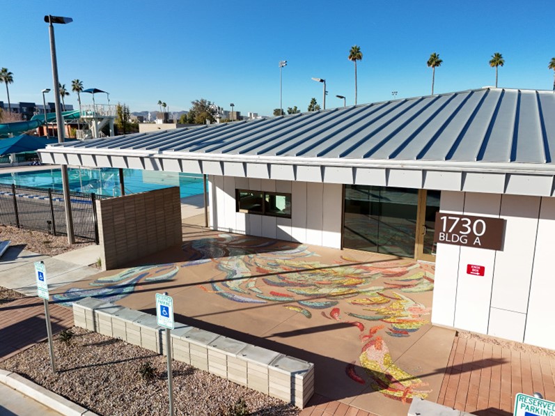 Image of the Clark Park Community Center with a mosaic in front